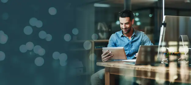 Man sitting with a laptop