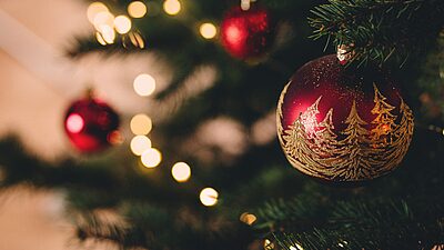 Red and gold baubles on Christmas tree