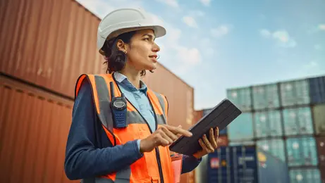 Female worker using a tablet on a construction site