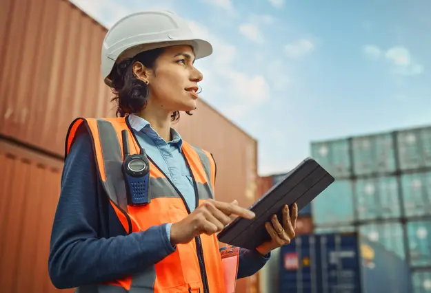 Female worker using a tablet on a construction site