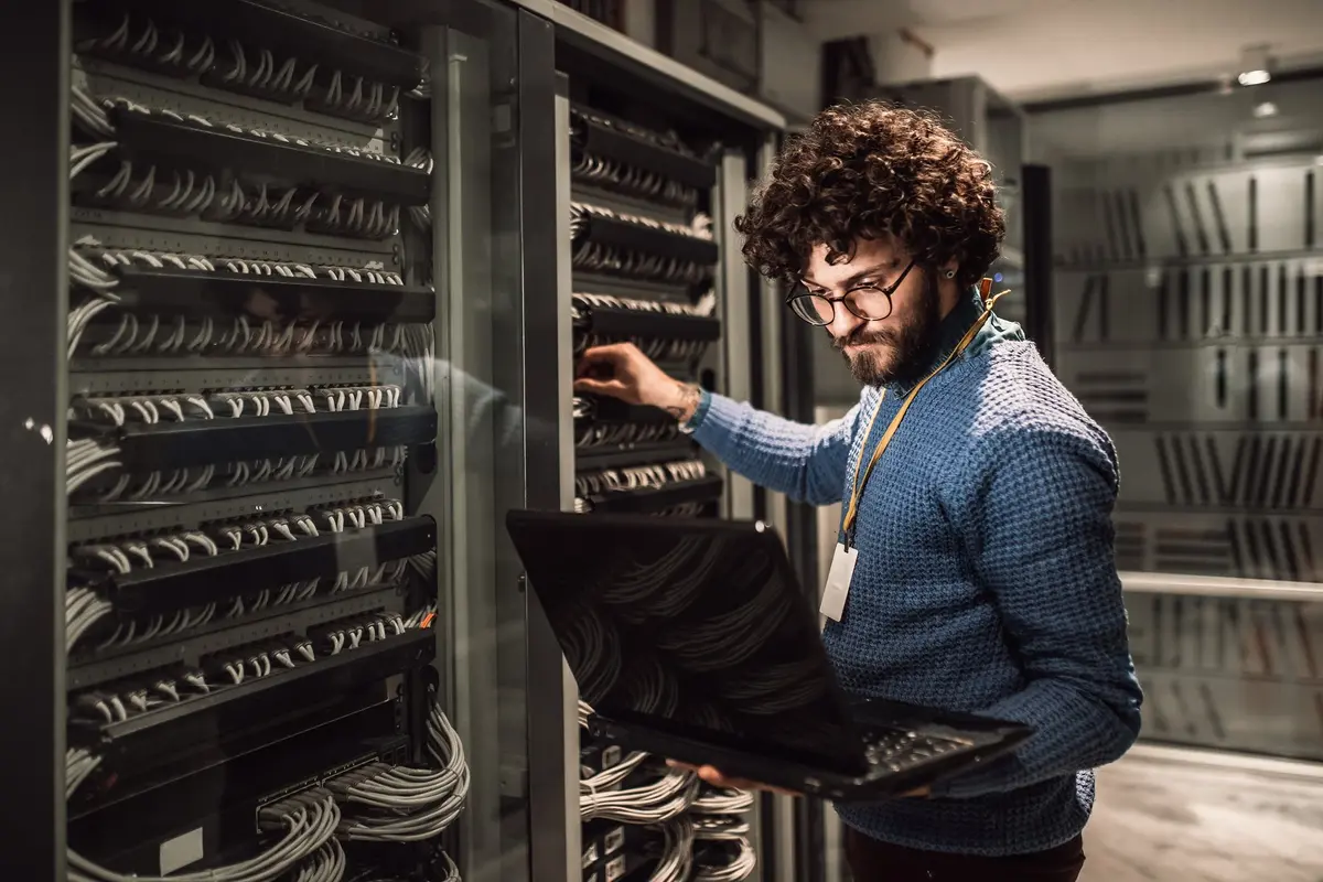 man in server room