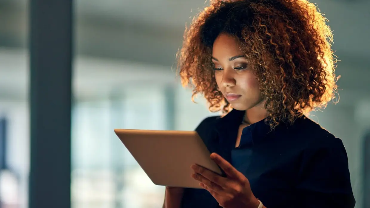 woman-looking-at-a-touchpad