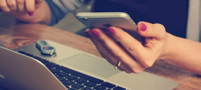 hand holding mobile device