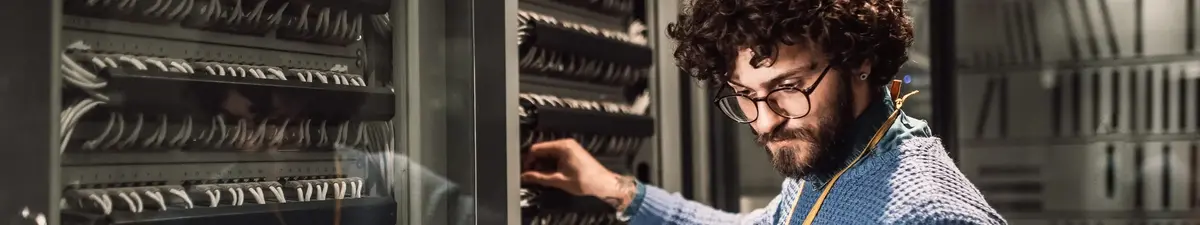 Man in a server room