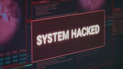 Monitor met een hackwaarschuwing, ter illustratie van een cyberaanval en malwaredreiging.