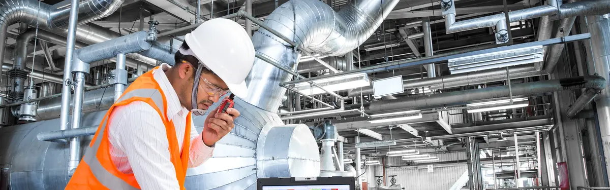Man in a machine room