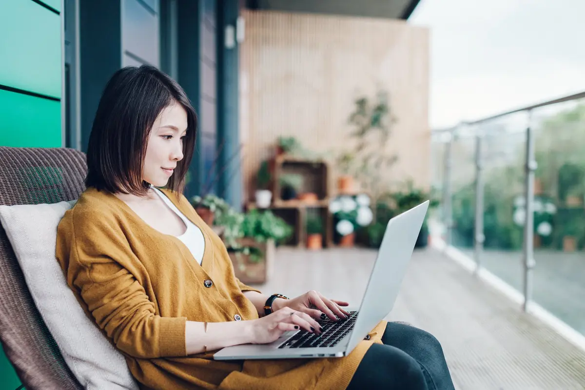Woman using her laptop
