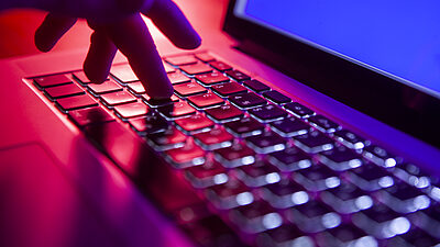 Typing on a laptop keyboard