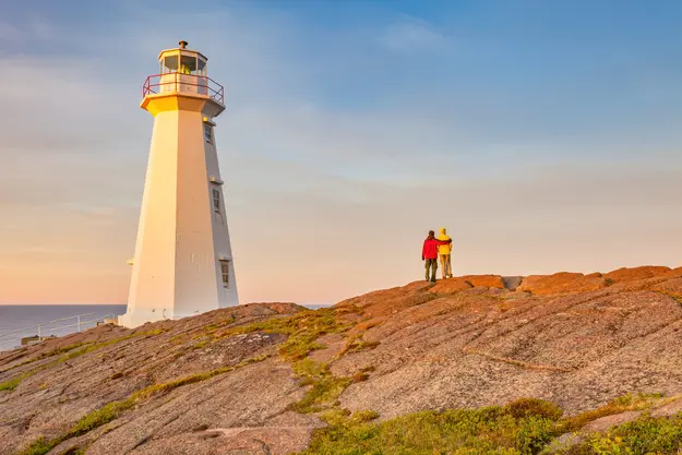 Lighthouse at sunset illustrating Managed Vulnerability Intelligence – continuous visibility over threats