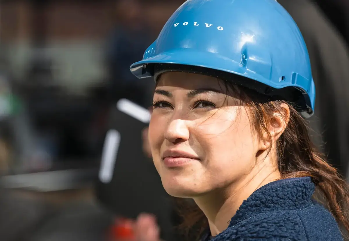 Woman in safety equipment at a work site