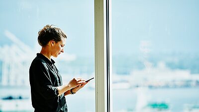 Woman window phone