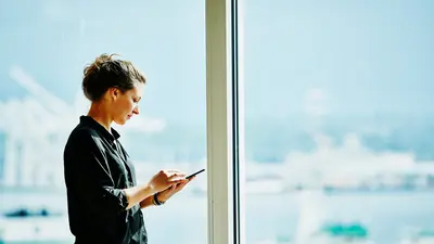 Woman window phone