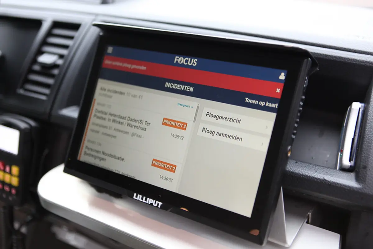 close-up of a digital device screen displaying a user interface with navigation options and data.