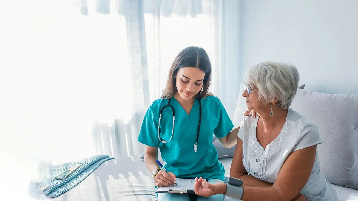 doctor and elderly woman
