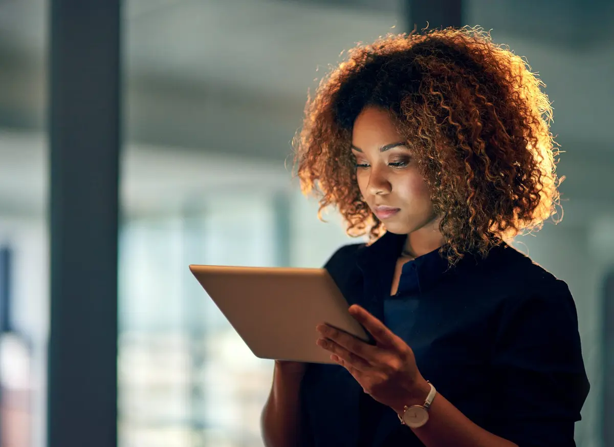 Woman reading on iPad