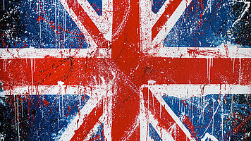 An artistic depiction of the union jack flag which is scratched and torn