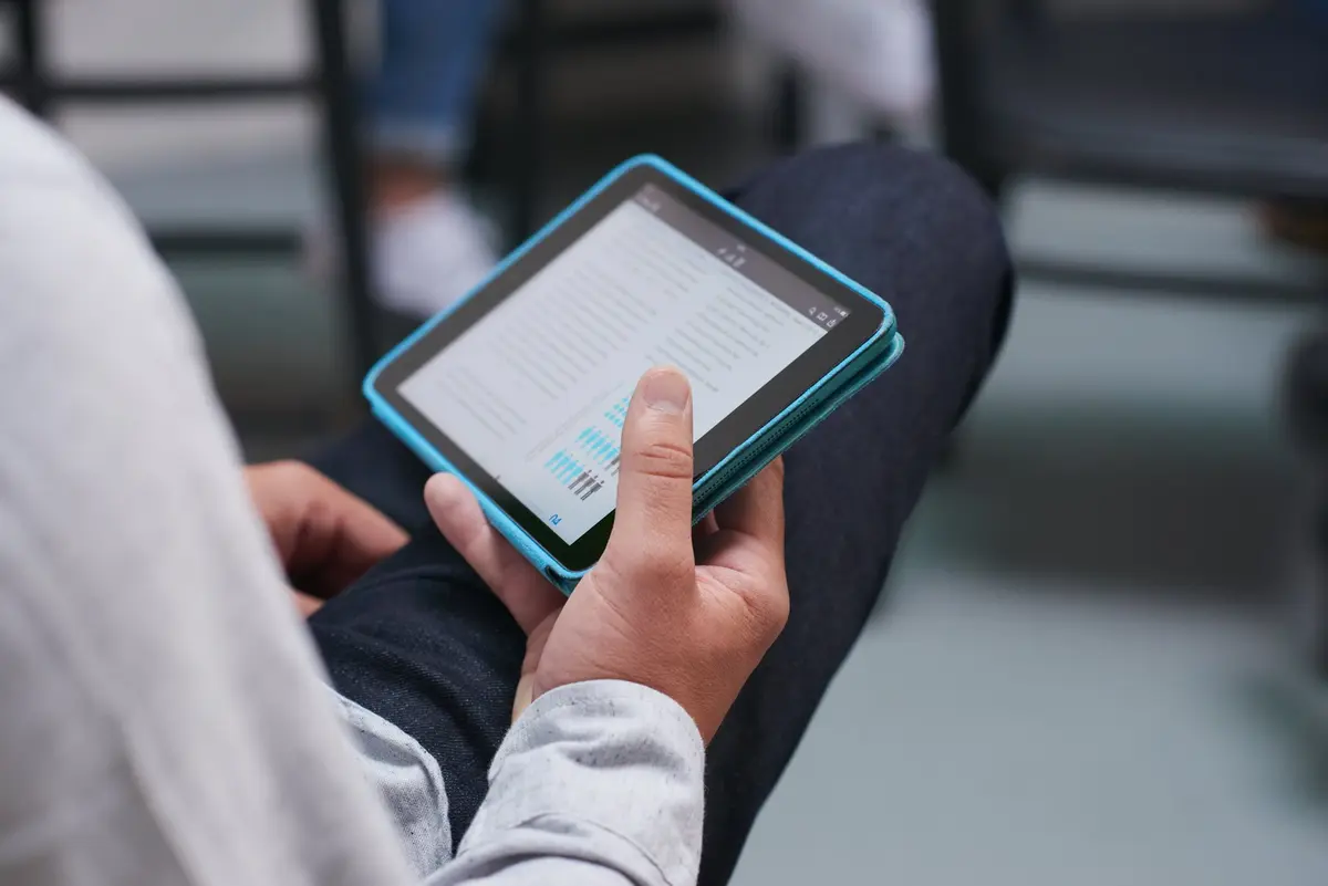 person holding mobile device